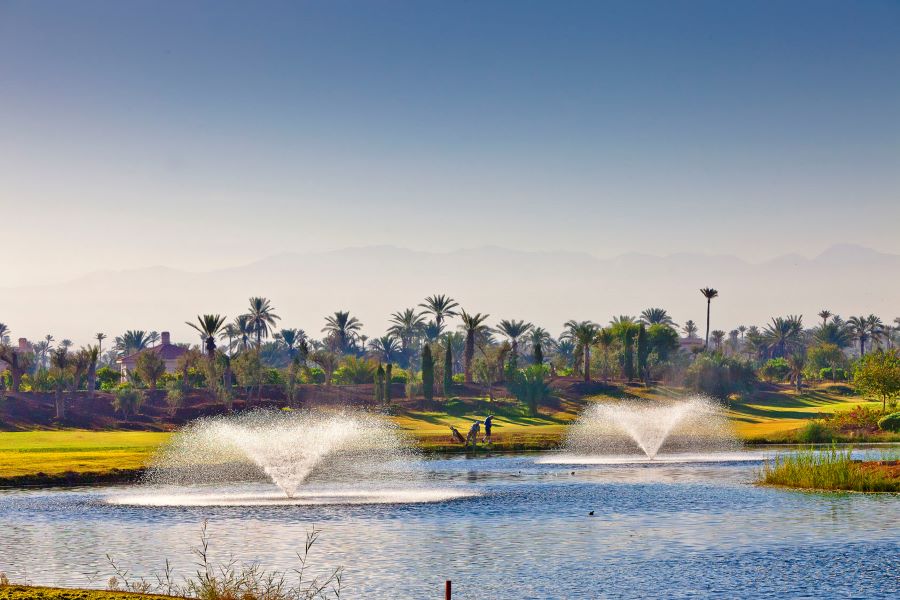 Water fountains in lake on course at Golf Club Palmeraie Marrakech