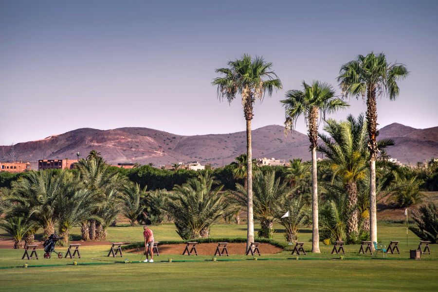 Golfer on driving range at Golf Club Palmeraie Marrakech