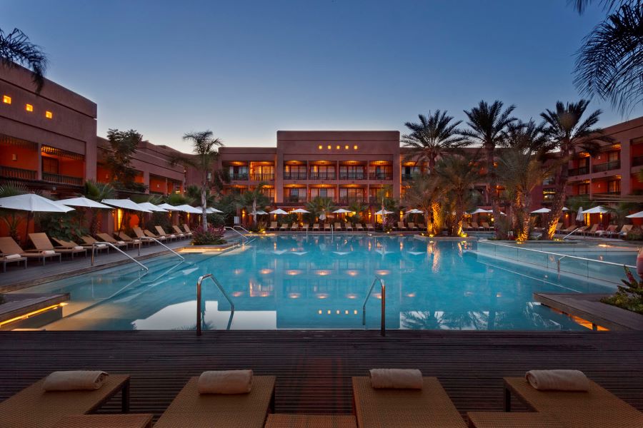 Swimming pool at night at Pickalbatros Hotel Du Golf Palmeraie in Marrakech
