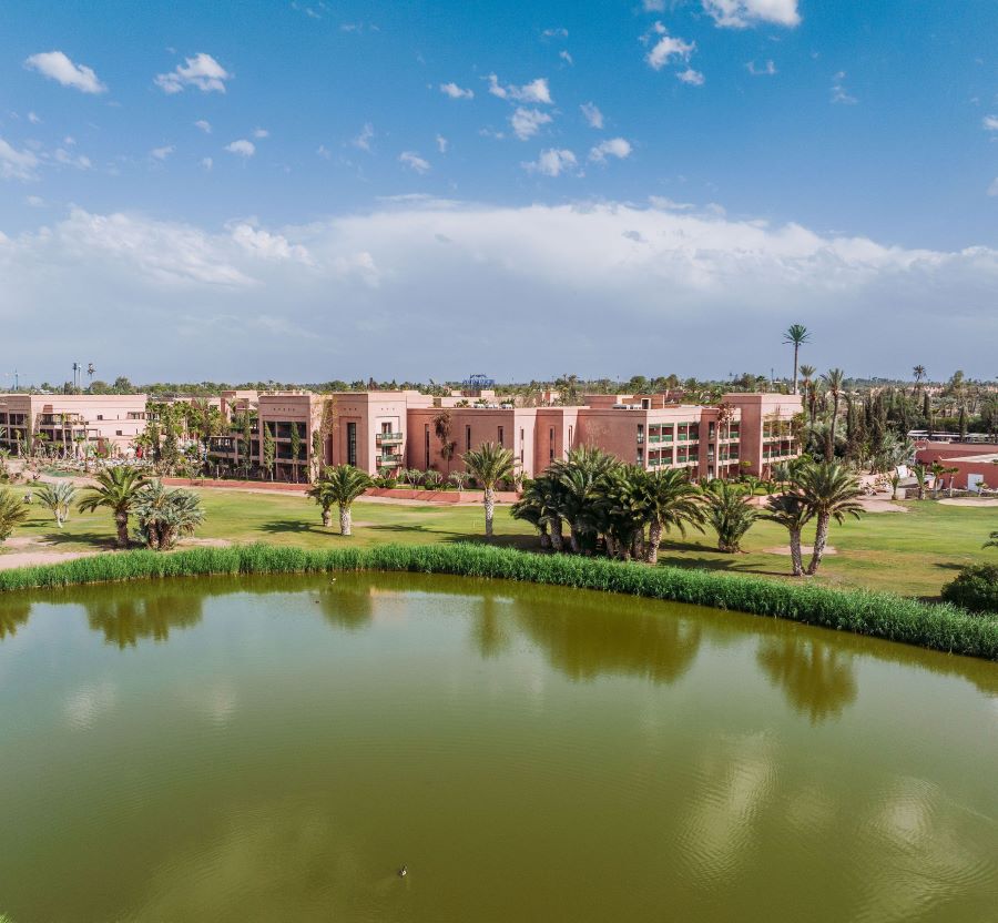 Large lake in front of golf course and Pickalbatros Hotel Du Golf Palmeraie Marrakech
