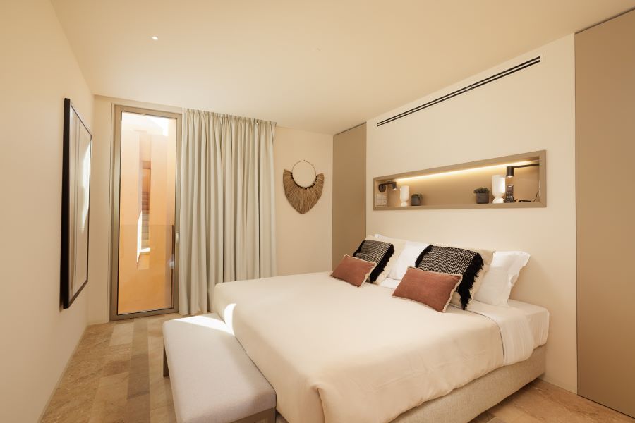 Double bed at Palmares Signature Apartments