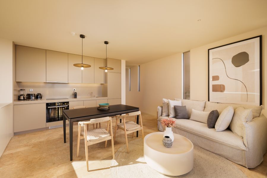 Kitchen and living area at Palmares Signature Apartments