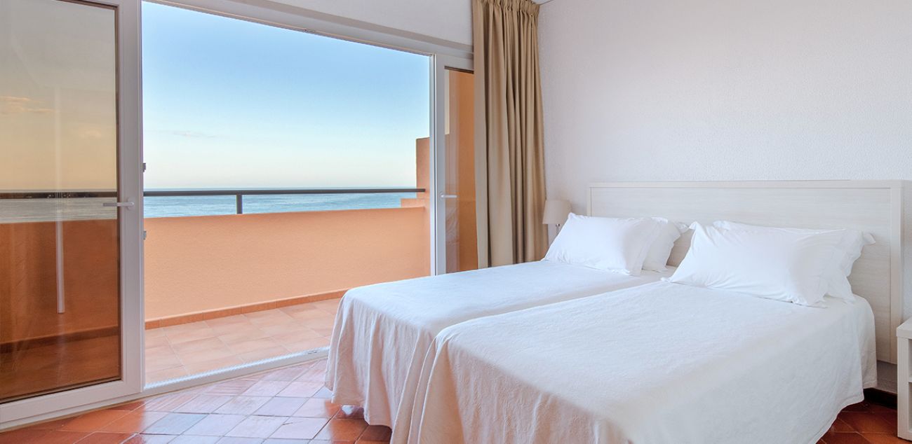 Twin beds in room at Dom Pedro Lagos Hotel in Western Algarve region