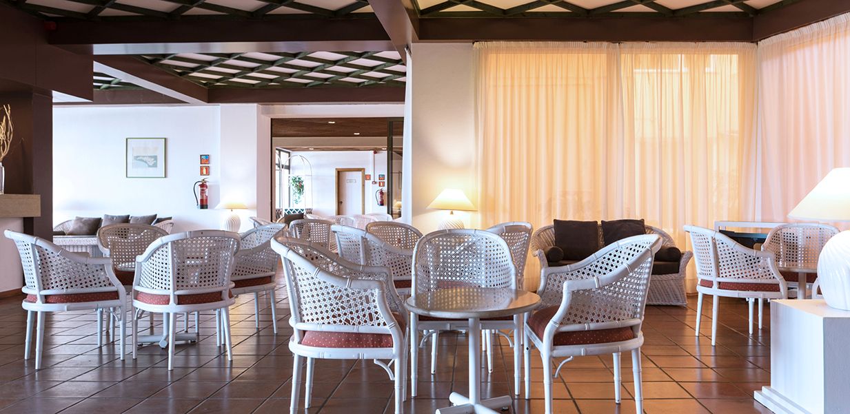 Outdoor seating at Dom Pedro Laguna Hotel