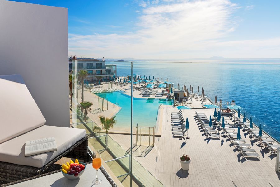 Balcony views of the pool and the sea at Elba Sunset Mallorca Thalasso Spa Hotel