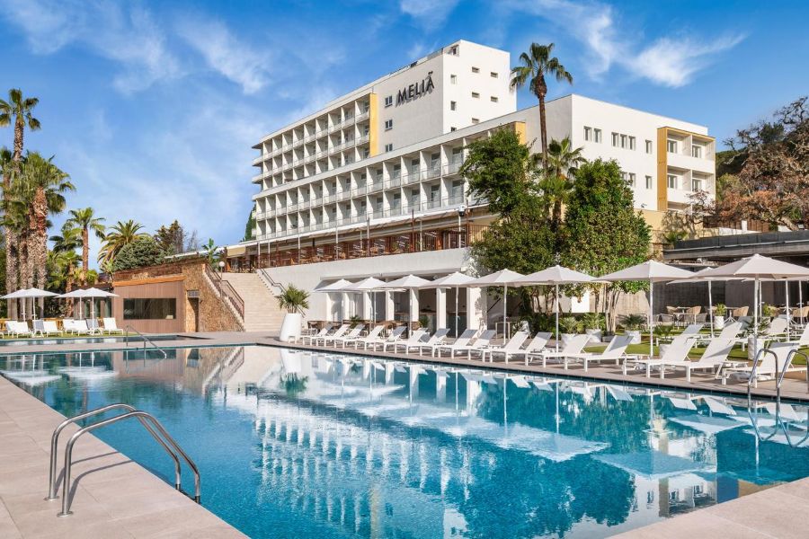 Exterior of Melia Lloret De Mar with the swimming pool being overlooked by the rooms of the resort