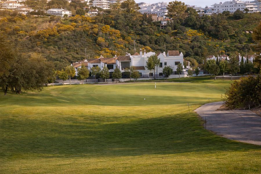 Villas surrounding the golf course at Azata Golf's 13th hole