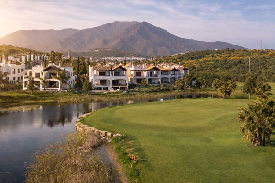 Apartments and villas behind the green on the 15th at Azata Golf