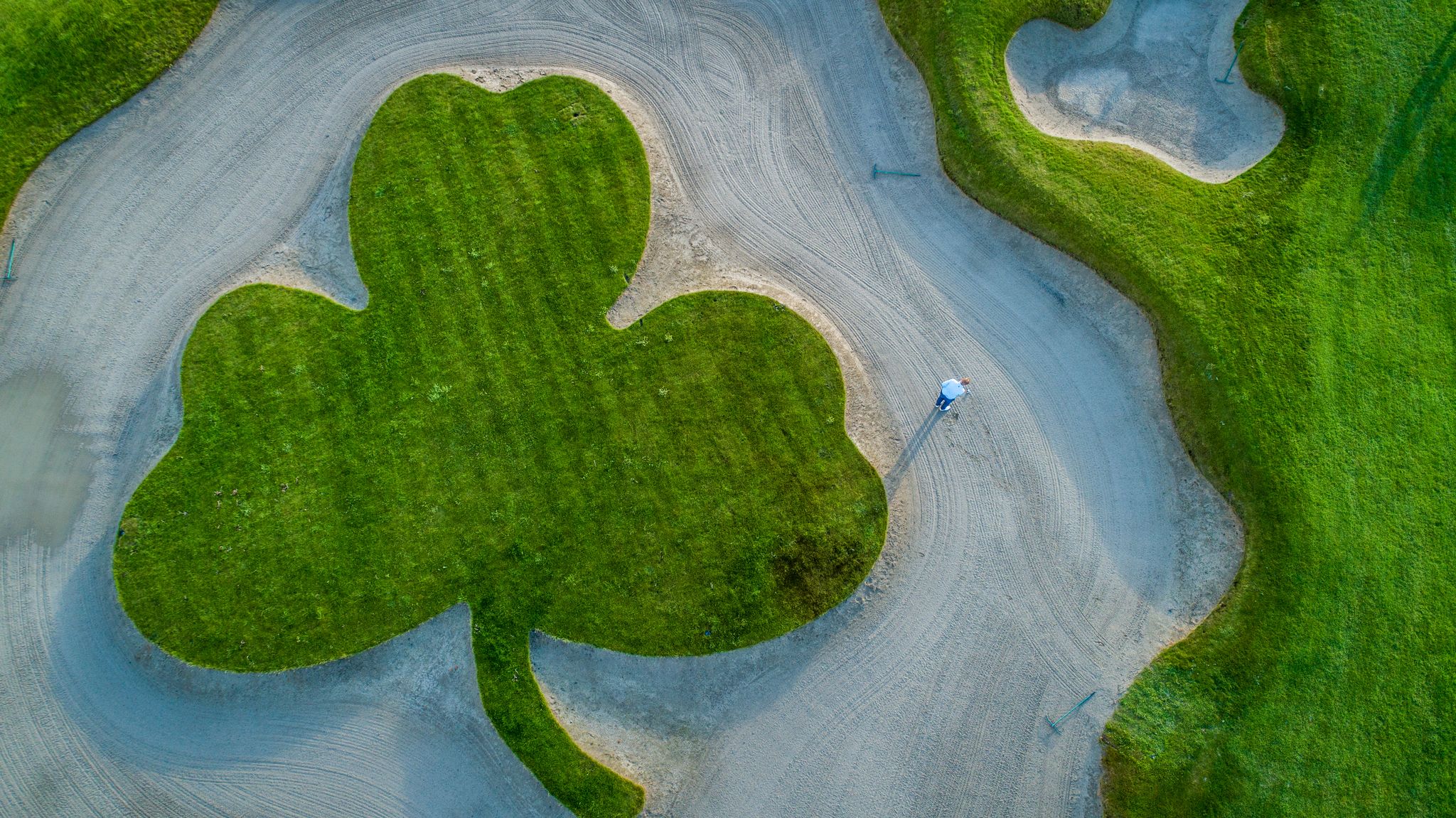 Shamrock carved into the bunker at Killeen Castle golf course in Ireland