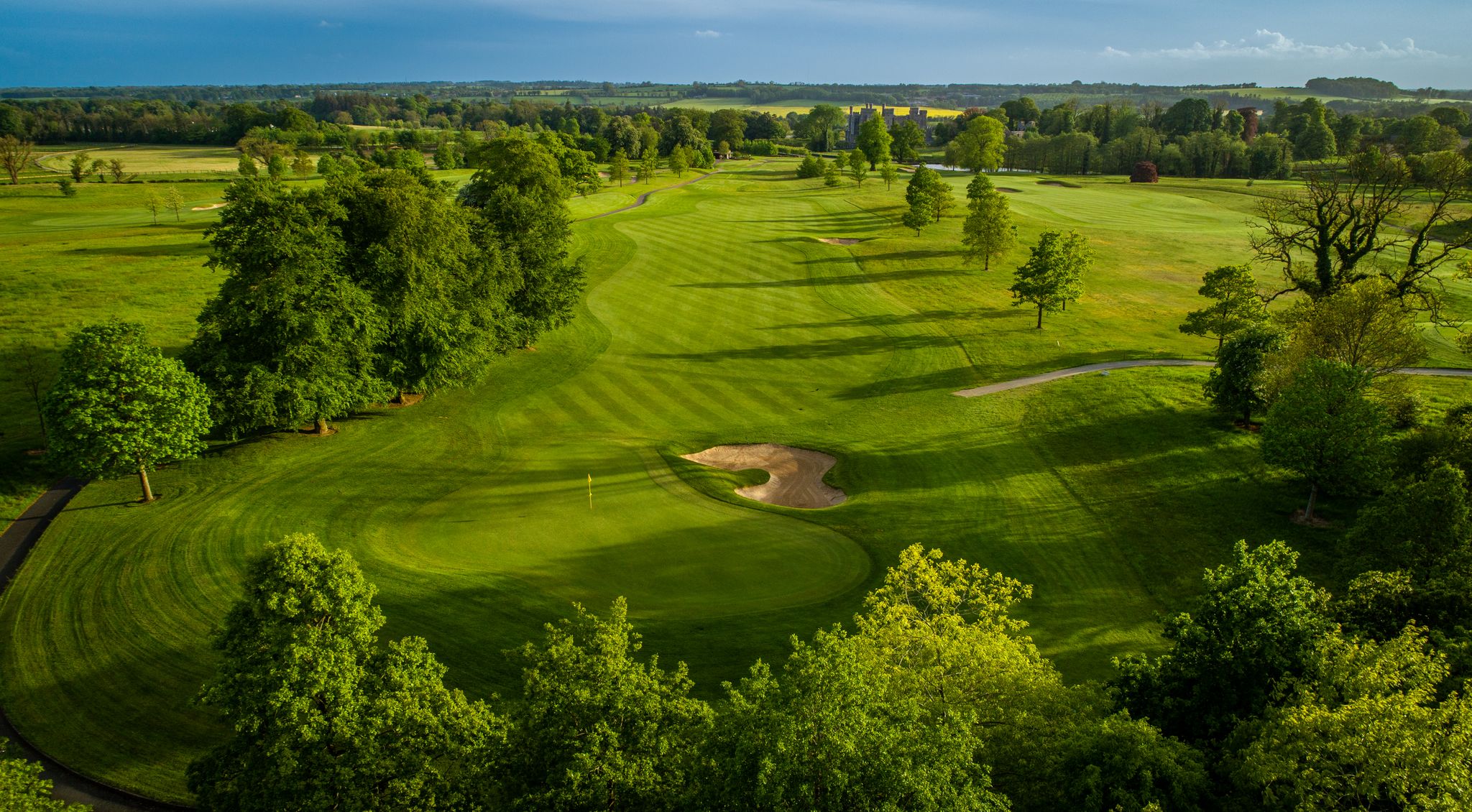 Green fairways with trees either side at Killeen Castle