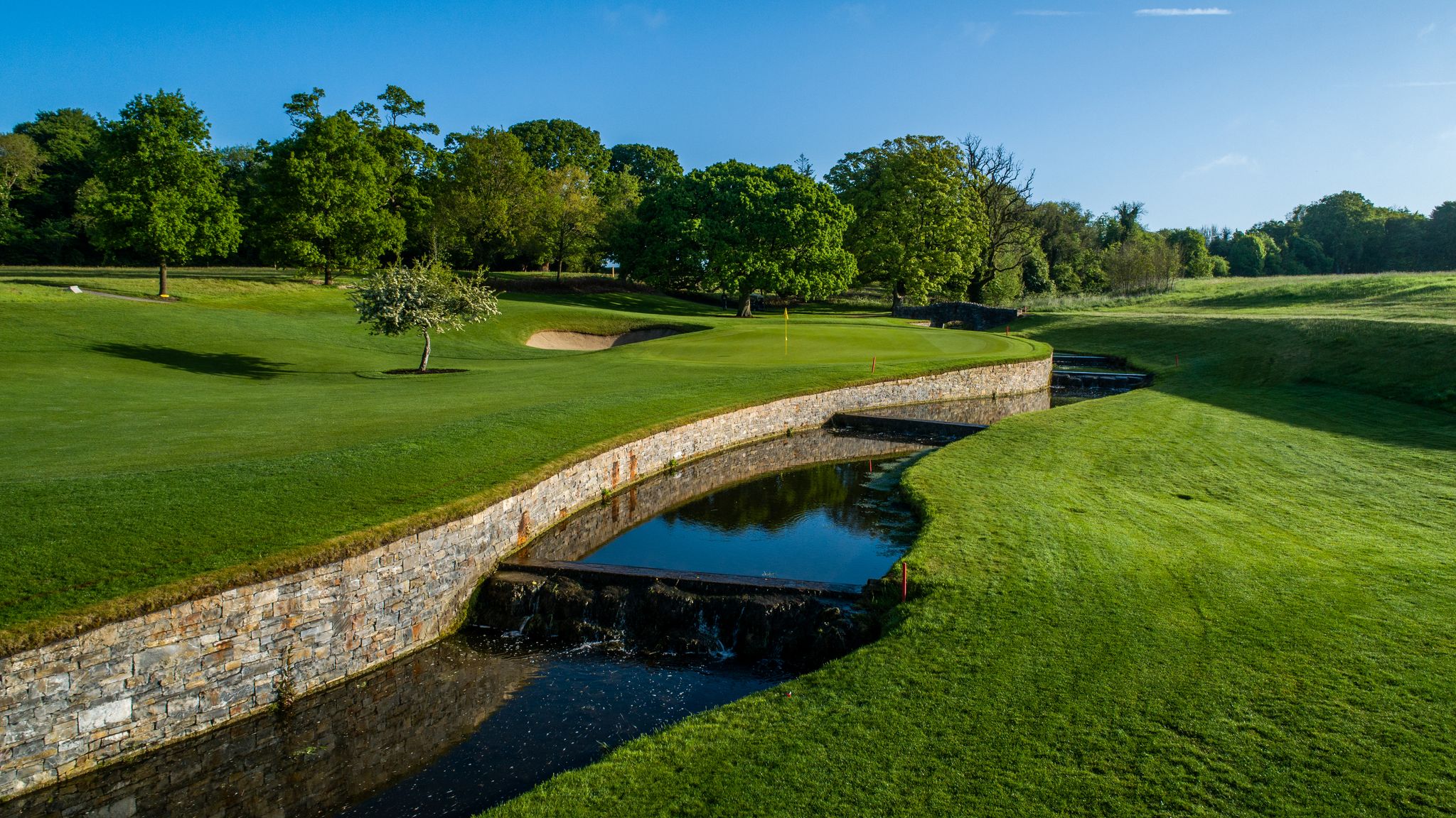 Killeen Castle golf course with stream running between green and fairway