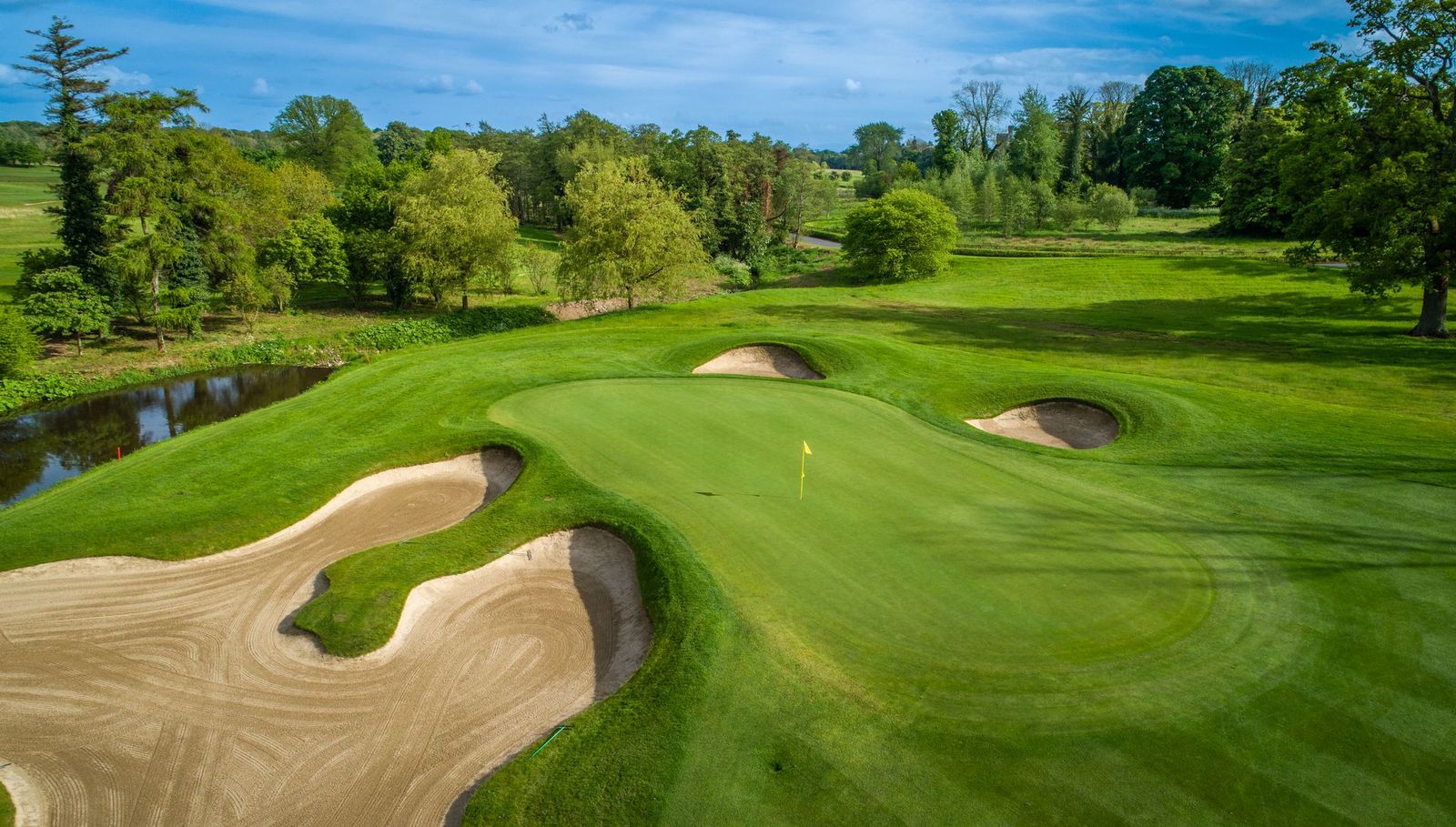 Bunkers surrounding the green at Killeen Castle golf course in Ireland