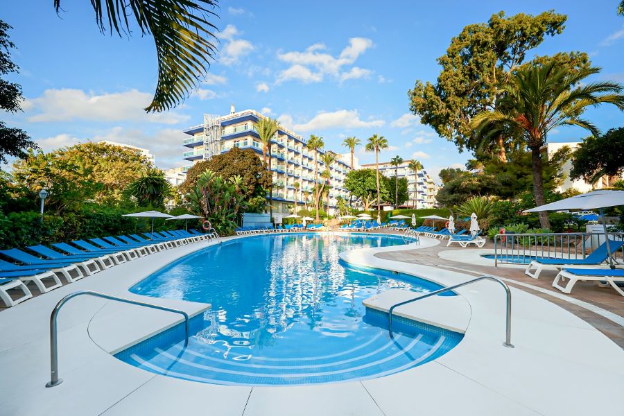 Swimming pool with Hotel Palmasol Benalmadena in the background